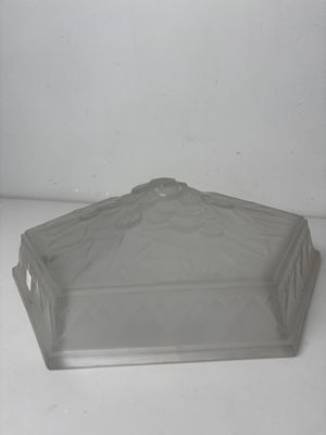 a clear plastic container with a lid on a white surface