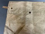 a piece of paper with a hole in it on a table