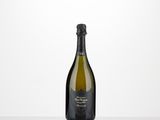 a bottle of champagne sitting on top of a table
