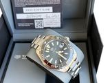 a watch that is in a box on the table