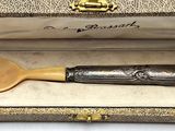 a wooden spoon and a wooden spoon in a box