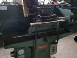a machine that is sitting in a room with many other machines