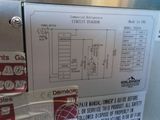 a picture of a refrigerator with a lot of stickers on it
