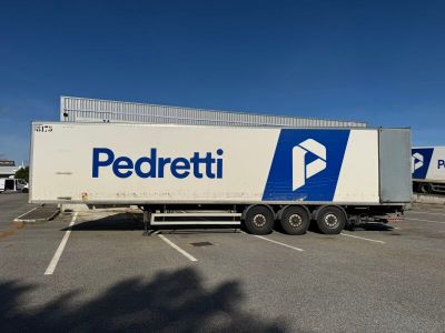 a semi truck that is parked in a parking lot