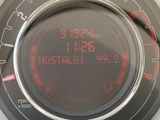 a close up of a speedometer on a car ' s dashboard