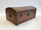 a small wooden chest with a metal latch on it