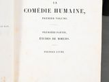 a book opened to show the title of a poem