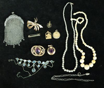 some of the jewelry is laid out on a black surface