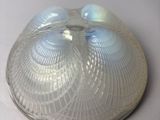 a close up of a glass object on a table