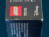 a box of legos sitting on a blue surface