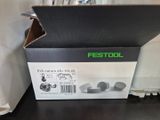 a box that is sitting on a table with a pair of ear buds in it
