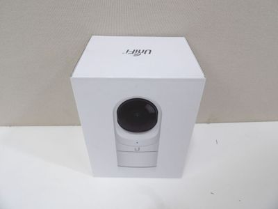 an image of a white box with a camera inside of it