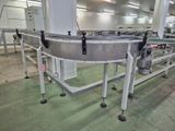a conveyor belt in the middle of a factory