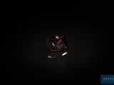 gros plan d'un diamant rouge sur une surface noire