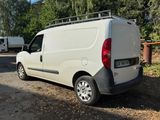 a white van that is parked in a lot