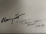an old photo of a man ' s handwritten signature on a piece of paper