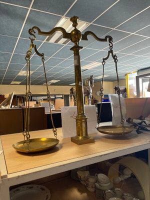 a scale that is sitting on a table in an office