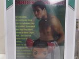 the box of a toy figure of a man with a boxing glove