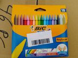 brightly colored crayons in a box with a price tag