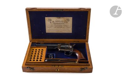 an old wooden box with a gun inside of it on a white background