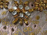 an image of a gold and silver dress on a mannequin mannequin mannequin mannequin mannequin mannequin mannequin mann