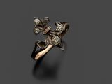 une image représentant une bague en or ornée d'un motif floral