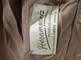 a close up of a label on the back of a jacket