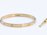 Bracelet « Love » Cartier en or jaune 18 carats avec vis
