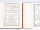an open book with two pages on it sitting on top of a table
