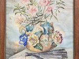 une peinture à l'huile représentant des fleurs dans un vase sur une table