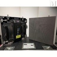 two speakers that are sitting next to each other on a table