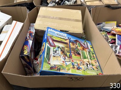 many boxes of legos in a pile on the floor