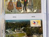 four postcards with pictures of people and animals on them