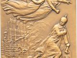 un gros plan d'une plaque en bronze ornée d'anges