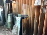 many pieces of glass on the floor in this room