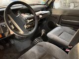 a car that has a steering wheel and a dash board