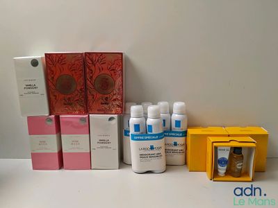 several boxes of skin care products sitting on a white surface