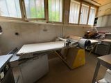 a room with a table and a machine in it