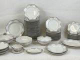 a lot of plates that are sitting on a table