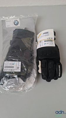 a pair of gloves and a pair of gloves sitting on a table