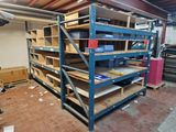 a room with a lot of shelves and boxes on it