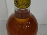 a bottle of alcohol that is sitting on a table