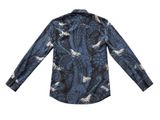 the shirt is blue and black with a pattern on it
