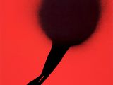 a black and red poster with a silhouette of a person holding a ball