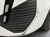a close up view of a car ' s front bumper
