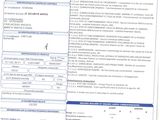 a close up of a document with a picture of a car on it