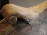 a close up of a clay vase with a crack in it