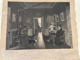 a black and white photo of a man and a dog in a living room
