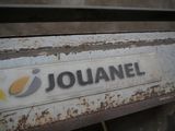 a sign that says jouanel on the side of a truck