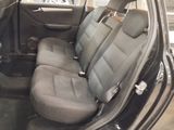 a car that has two seats in the back of it